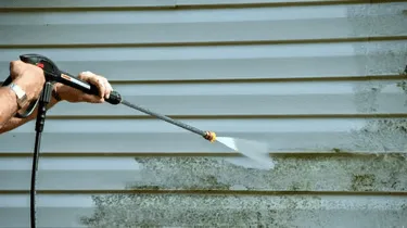 Pressure washing home siding